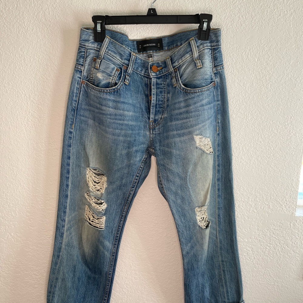Calvin Rucker Distressed Blue Jeans wide leg